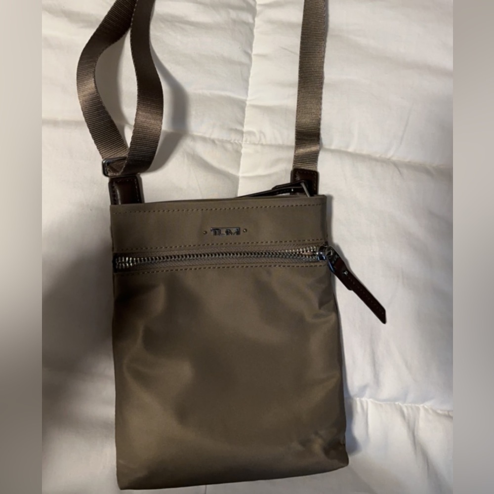 NWT. Tumi Cassandra mini pocket bag.